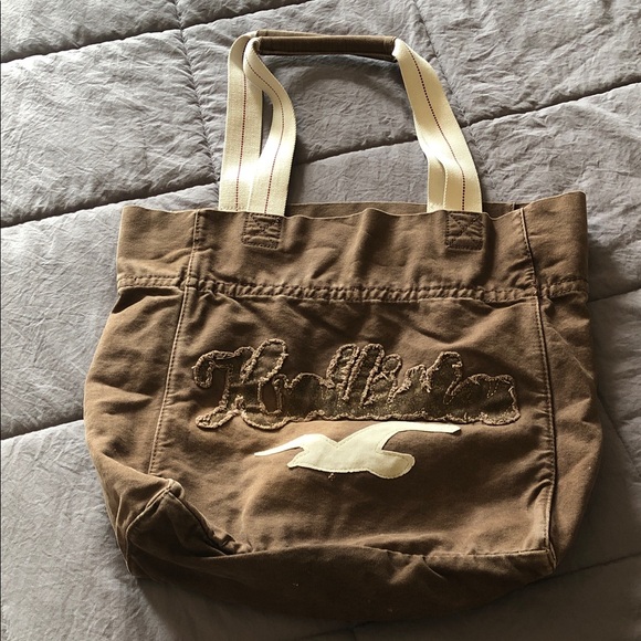 Hollister Handbags - Hollister Brown Canvas Tote with Cream Seagull Accent